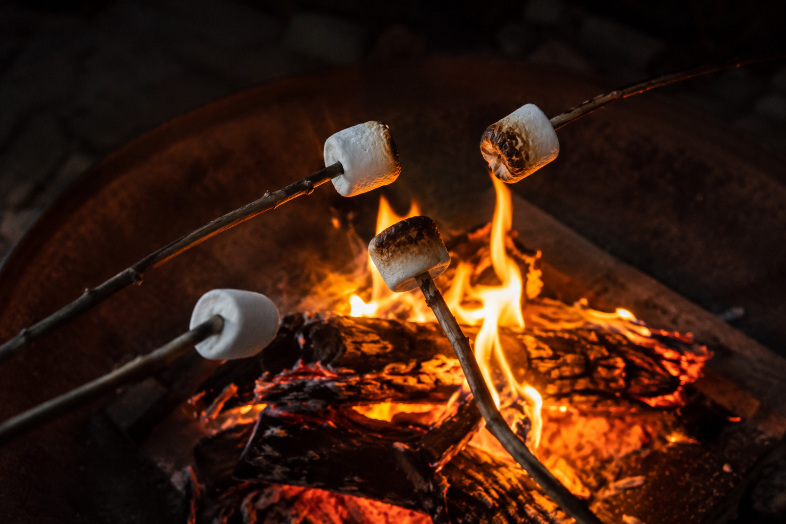Roasting marshmallows at Sunrise Summit Resort